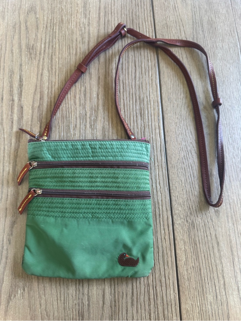 Vintage Dooney & Bourke green nylon North South Triple Zip crossbody